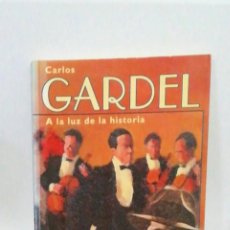 Libros de segunda mano: CARLOS GARDEL A LA LUZ DE LA HISTORIA NELSON BAYARDO TANGO MUSICA. Lote 398719134