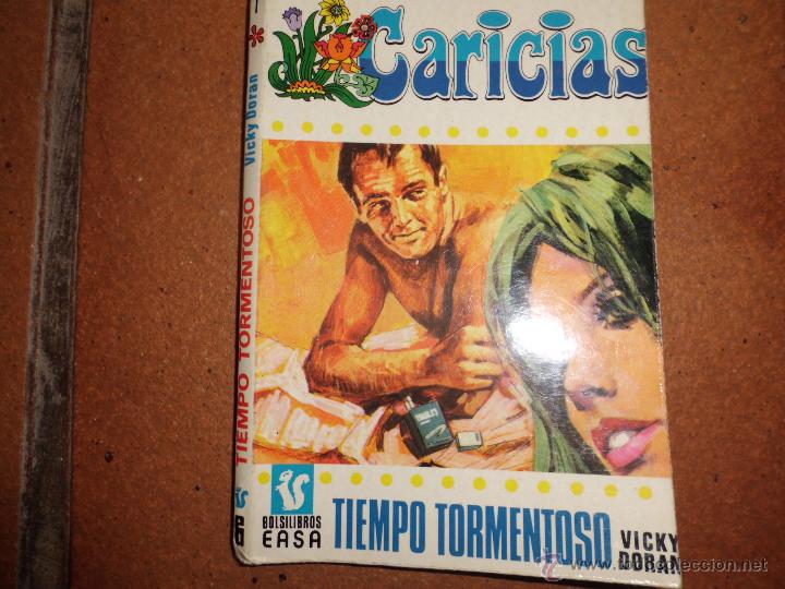 Libros de segunda mano: CARICIAS N&ordm; 1 BOLSILIBROS EASA TIEMPO TORMENTOSO VICKY DORAN