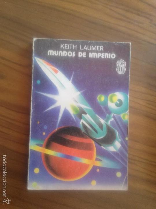 Libros de segunda mano: MUNDOS DE IMPERIO. KEITH LAUMER. MARTINEZ ROCA, TOCADO EN LOMO PARTE DE ARRIBA. E3 4