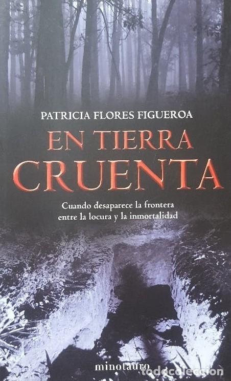 Libros de segunda mano: EN TIERRA CRUENTA. MINOTAURO