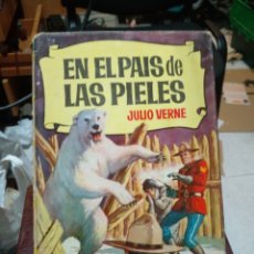 Libros de segunda mano: EN EL PAIS DE LAS PIELES JULIO VERNE. Lote 319415583
