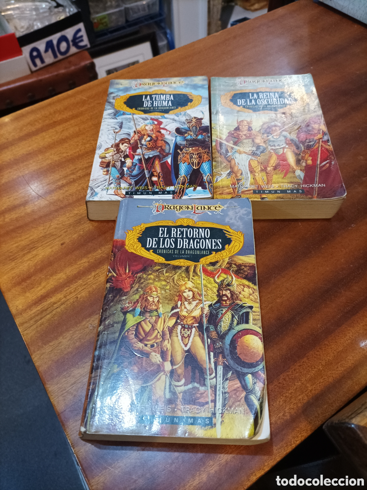 Second hand books: CRONICAS DE DRAG&Oacute;N LACE 1,2,3,(RETORNO DE LOS DRAGONES,LA TUMBA HUMA,LA REINA DE LA OSCURIDAD)