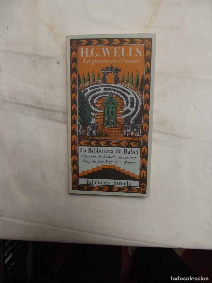 Libros de segunda mano: LA PUERTA EN EL MURO POR H.G. WELLS COLECION LA BIBLIOTECA DE BABEL EDICIONES SIRUELA