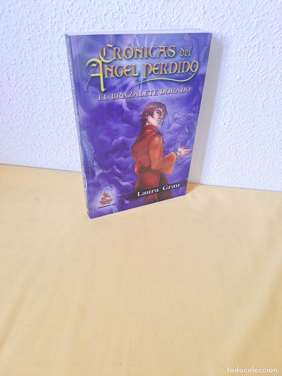 Libros de segunda mano: LAURA GRAU - EL BRAZALETE DORADO ( CRONICAS DEL ANGEL PERDIDO 2) - 2011 - DEDICADO