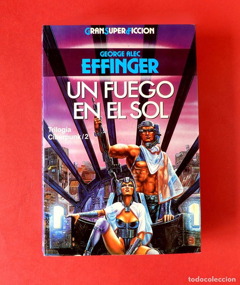 Libros de segunda mano: UN FUEGO EN EL SOL - TRILOG&Iacute;A CIBERPUNK II - GEORGE ALEC EFFINGER - ED. MART&Iacute;NEZ ROCA 1991