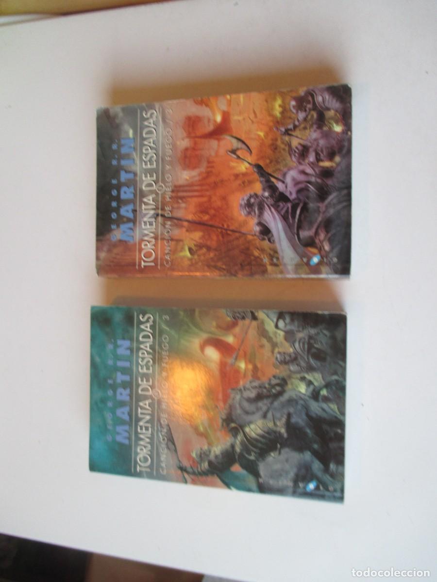 Libros de segunda mano: GEORGE R.R. MARTIN Tormenta de espadas ( tomos 1 y 2 de la trilog&iacute;a) W40252