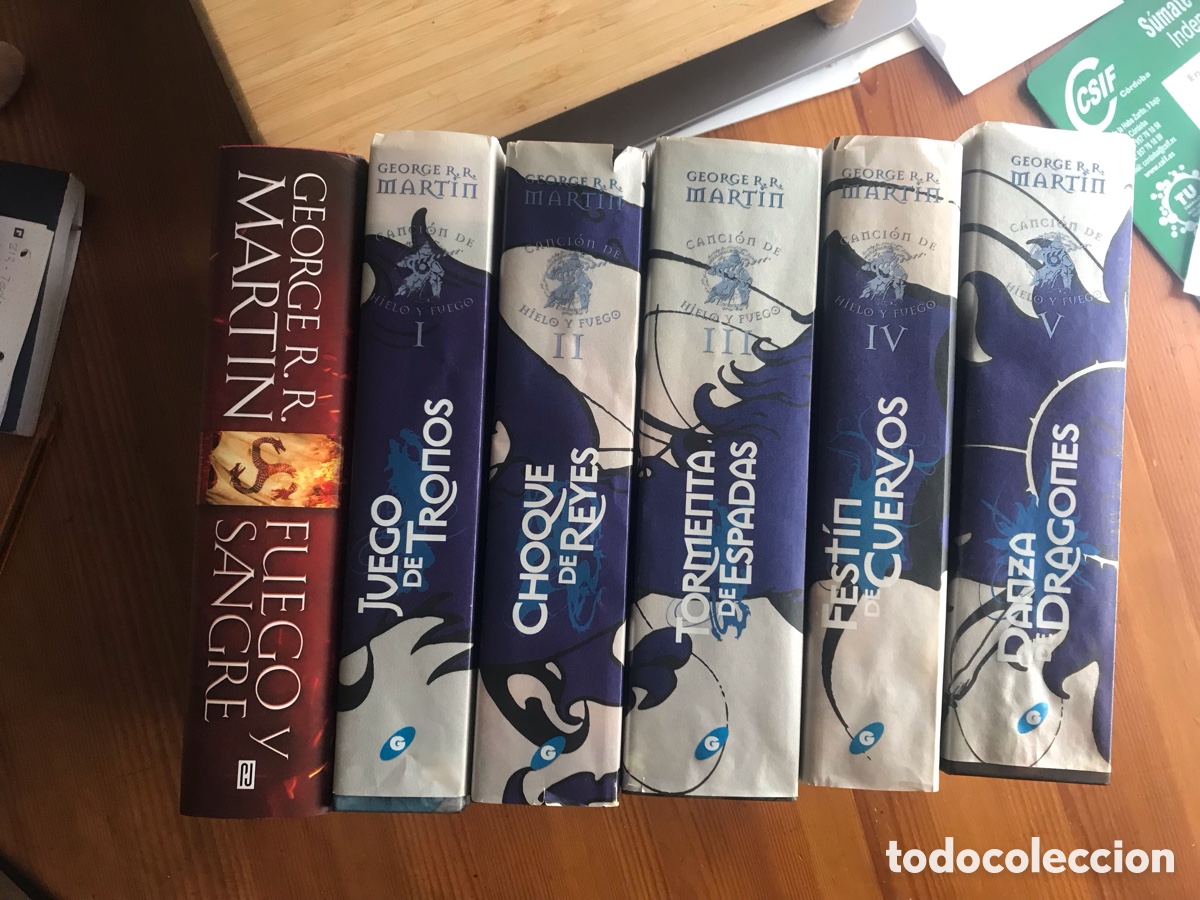 Second hand books: Juego de tronos los cinco tomos y fuego y sangre. George R. R. Martin
