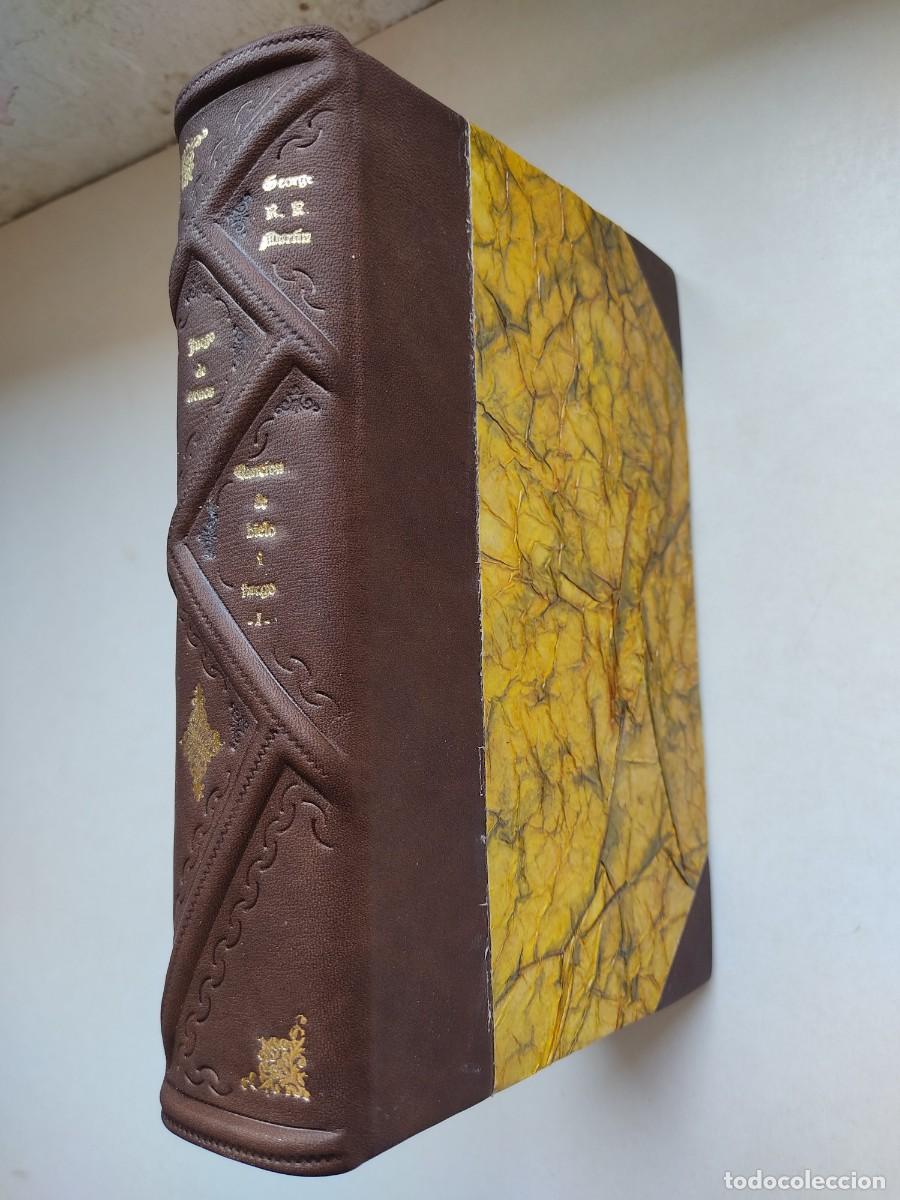 Libros de segunda mano: Juego de tronos / George R. R. Martin. Canci&oacute;n de hielo y fuego 1. Encuadernaci&oacute;n artesanal