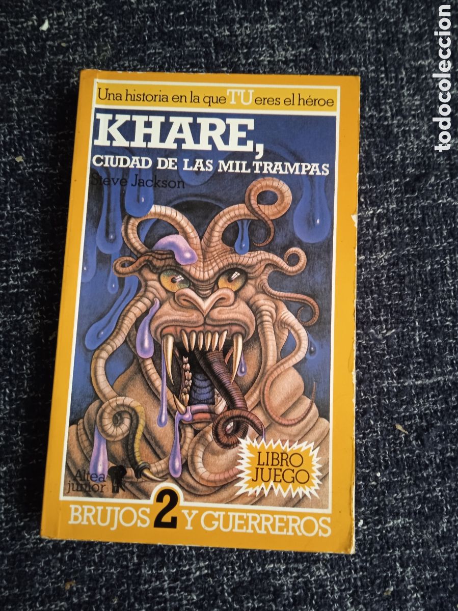 Libros de segunda mano: KHARE LA CIUDAD DE LAS MIL TRAMPAS / STEVE JACKSON - LIBRO JUEGO ALTEA - BRUJOS Y GUERREROS N&ordm; 2