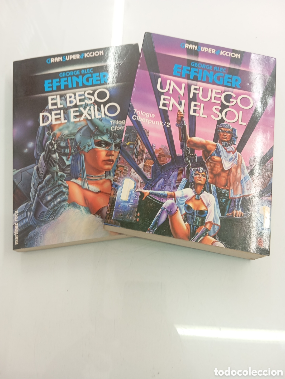 Libros de segunda mano: UN FUEGO EN EL SOL Y EL BESO DEL EXILIO TRILOG&Iacute;A CIBERPUNK GEORGE ALEC EFFINGER MARTINEZ ROCA 2 VOLS