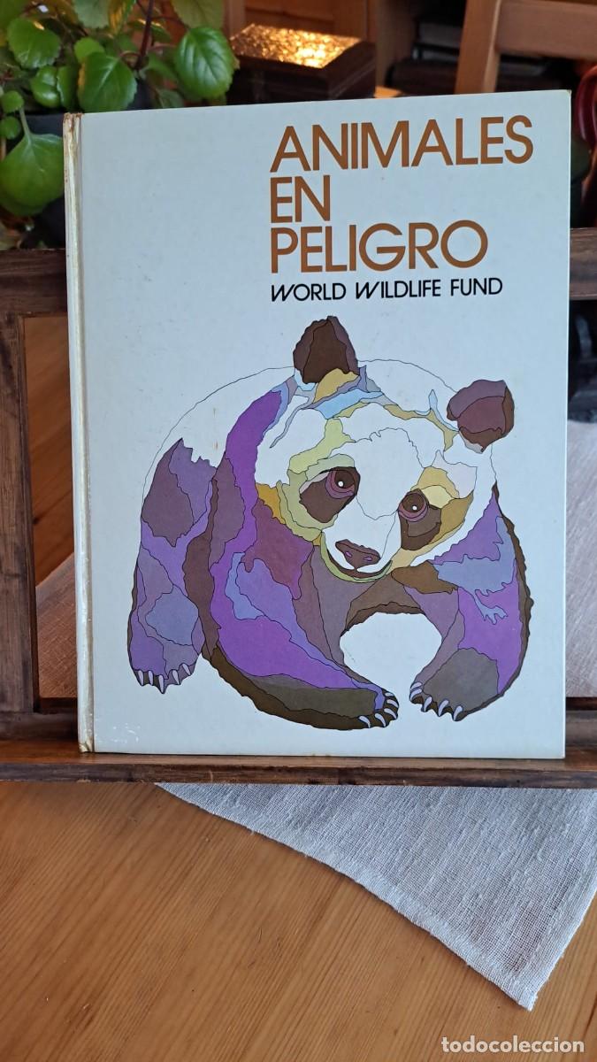 Libros de segunda mano: ANIMALES en PELIGRO / WORLD WILDLIFE FUND - Foto 1