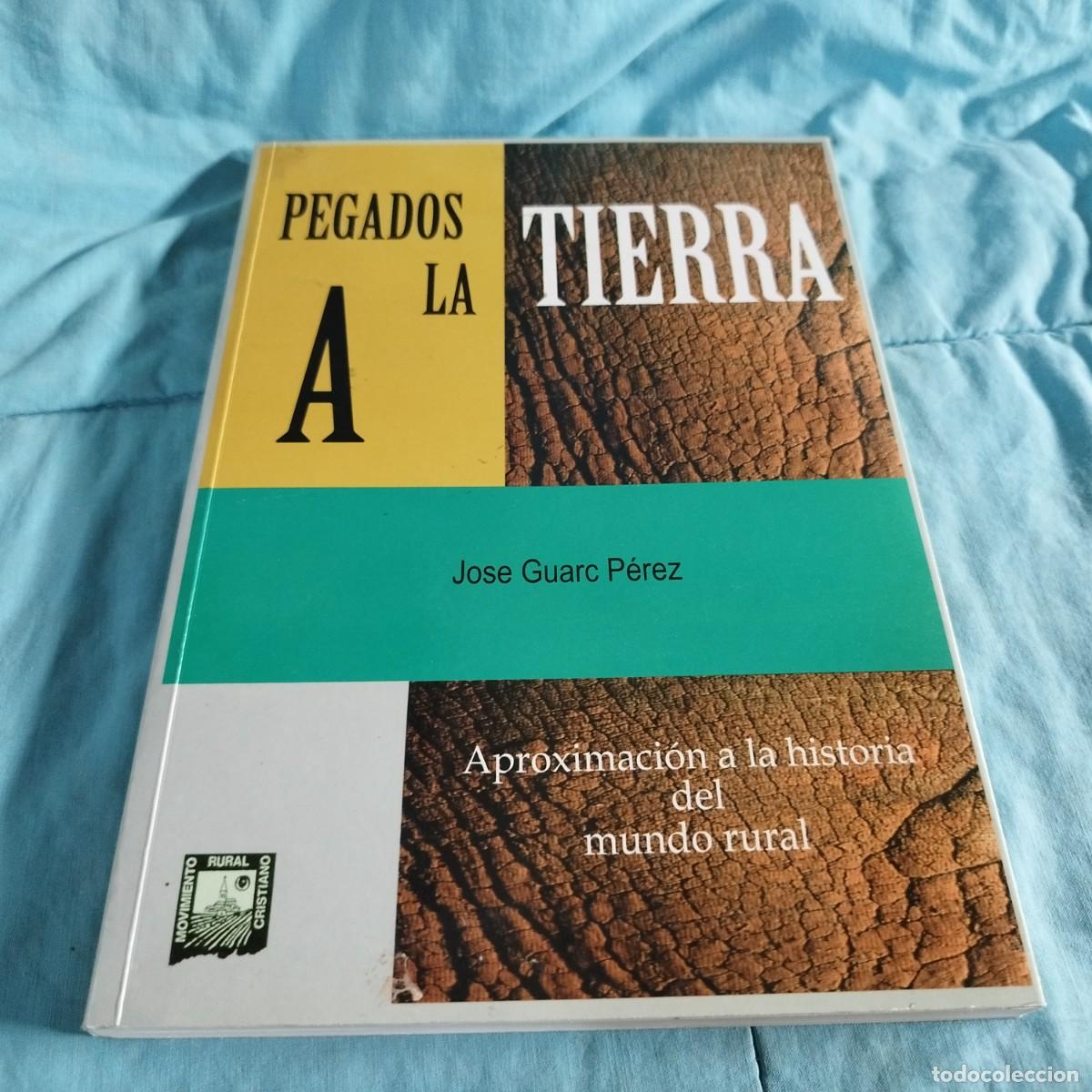 Libros de segunda mano: PEGADOS A LA TIERRA / JOSE GUARC PEREZ / CONS 614GV - Foto 1