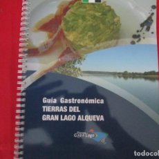Libros de segunda mano: GUIA GASTRONOMICA TIERRAS DEL GRAN LAGO ALQUEVA. Lote 273606903