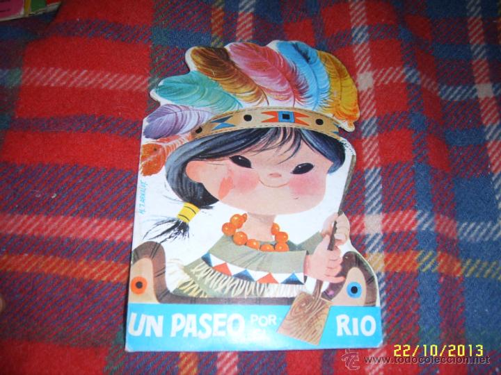 Libros de segunda mano: CUENTOS TROQUELADOS UN PASEO POR EL R&Iacute;O.M.J. ARNALOT.1971.MAGN&Iacute;FICO EJEMPLAR.