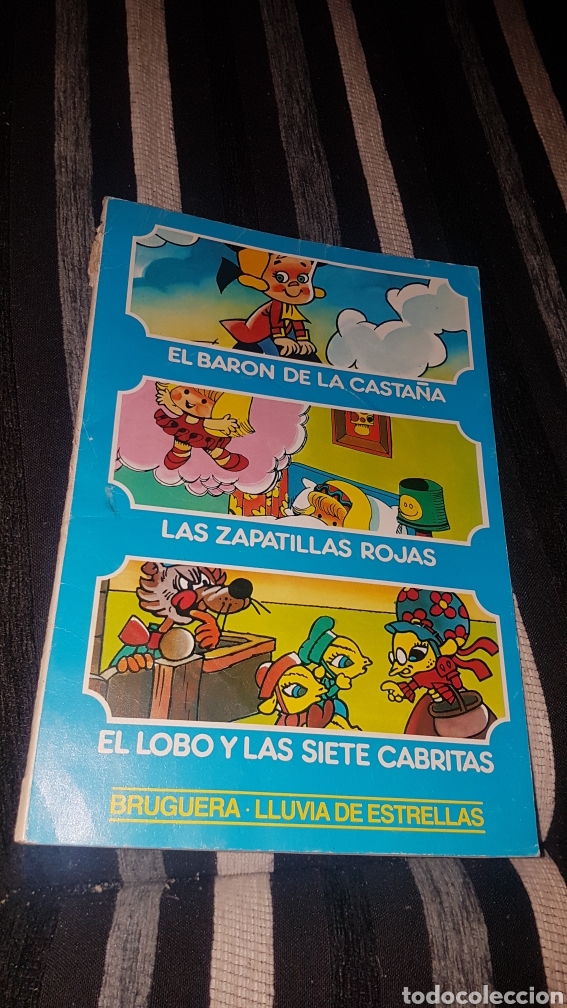 Livres d'occasion: Bruguera lluvia de estrellas el bar&oacute;n de la casta&ntilde;a las zapatillas rojas el lobo y las siete cabrita