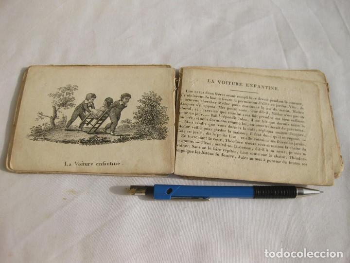 Libros de segunda mano: Libro sobre Juegos Ilustrado con grabados. Graveux representns divers Jeux. Etiqueta Cadiz. C. 1820.