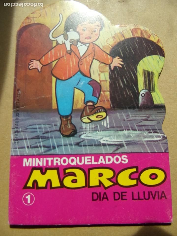 Libros de segunda mano: mini troquelados 14 cm x 9,5 cm Marco N&uacute;m.1 Dia de lluvia a&ntilde;o 1977