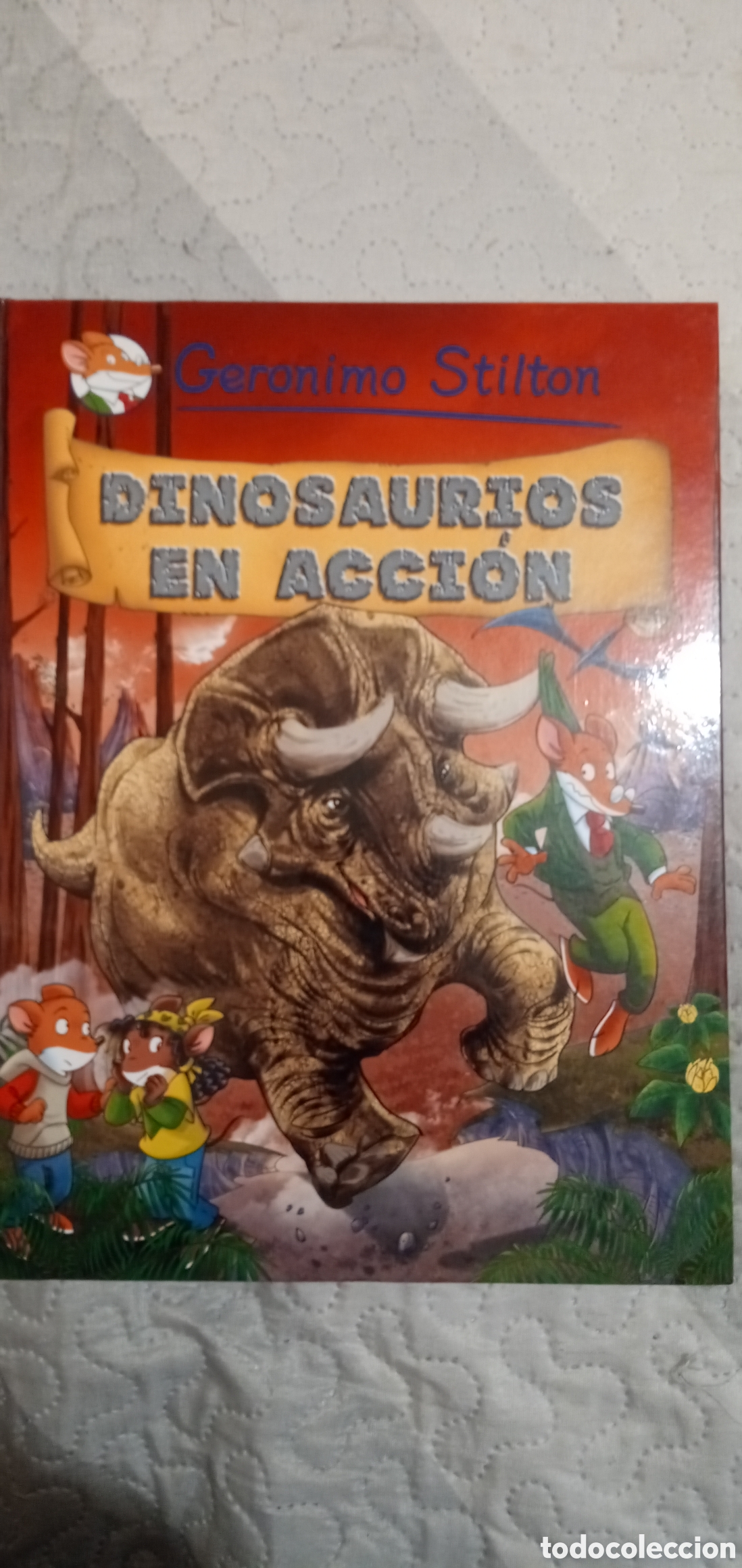 Libros de segunda mano: Geronimo Stilton.Dinosaurios en accion.2011.Buen estado. - Foto 1