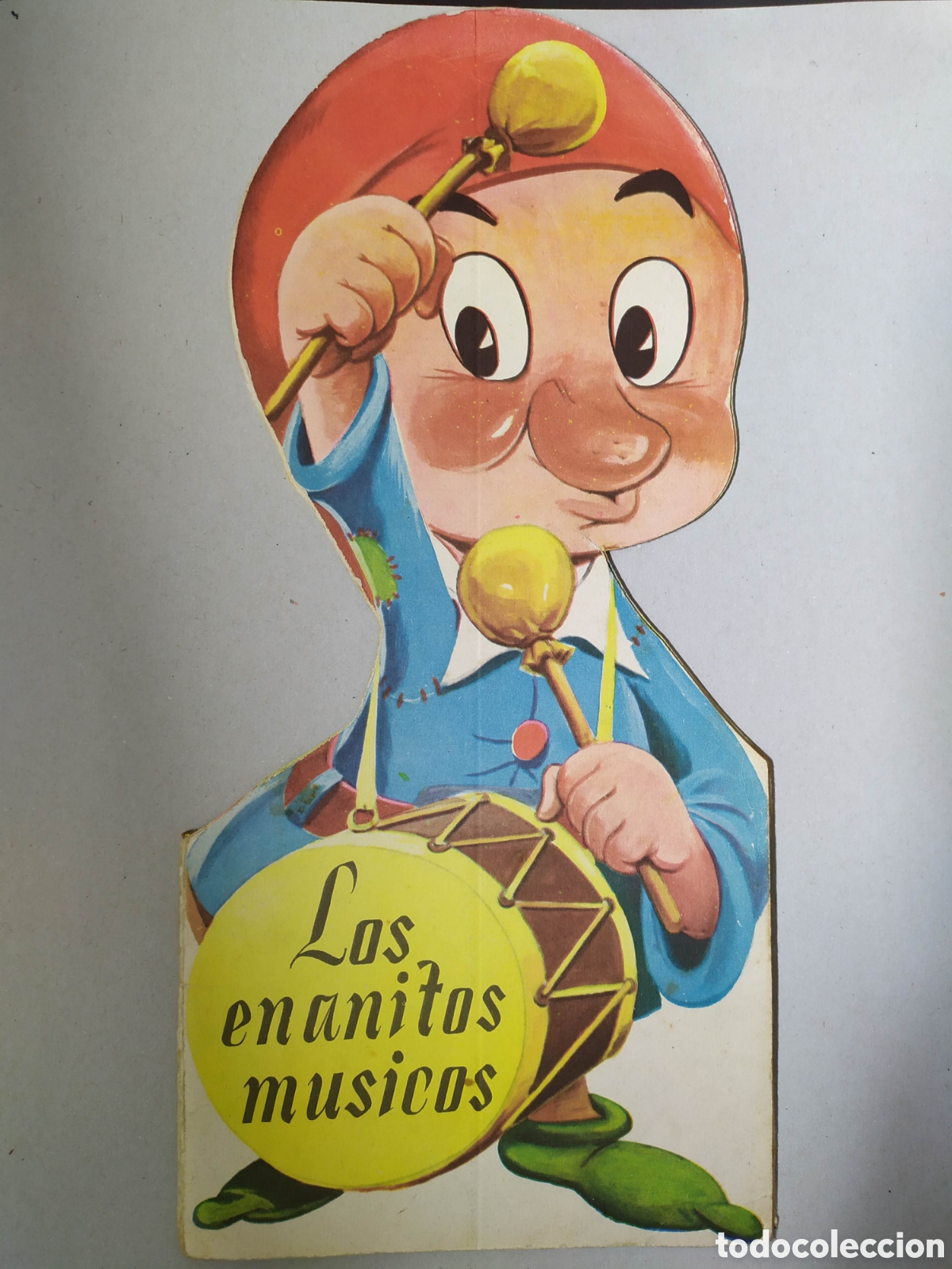 Libros de segunda mano: Cuento troquelado Los enanitos musicos.