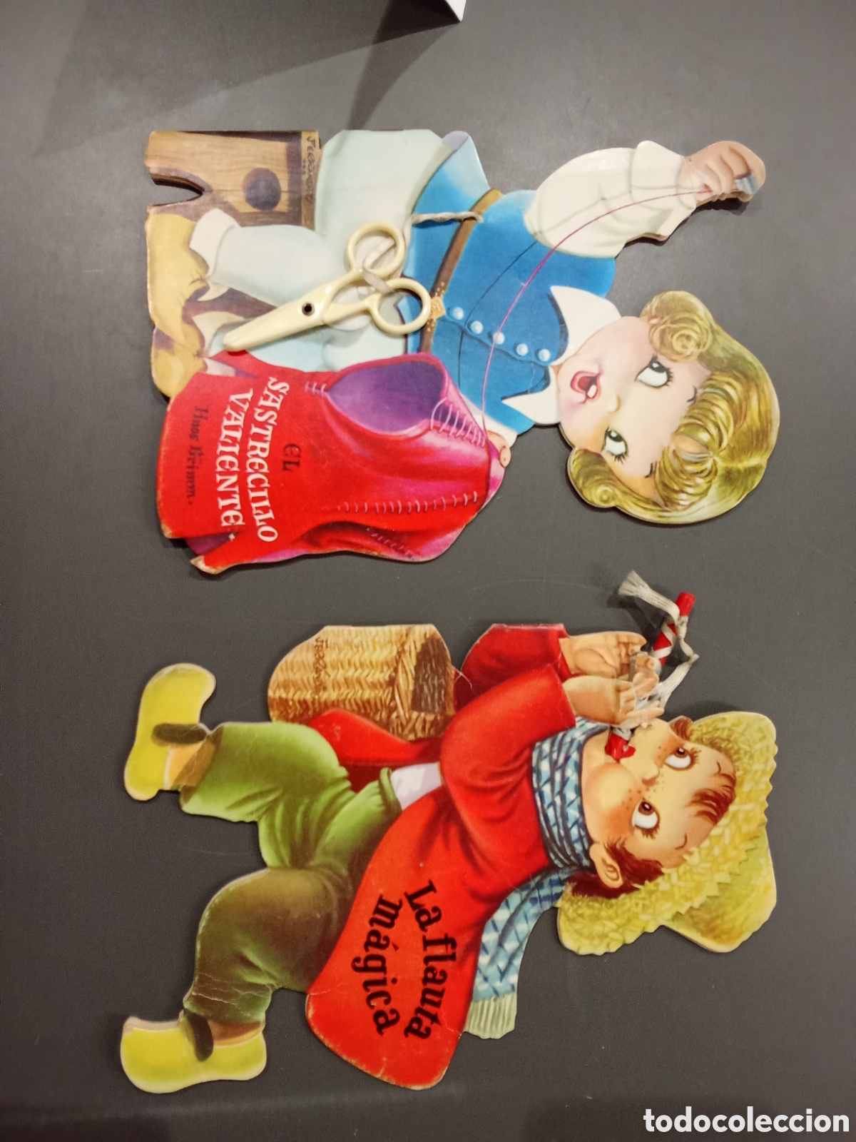 Libros de segunda mano: 2 Cuentos troquelados Juan Ferrandiz - El sastrecillo valiente / La flauta m&aacute;gica