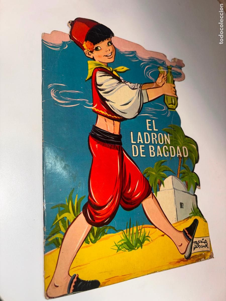 Libros de segunda mano: EL LADR&Oacute;N DE BAGDAD Cuentos clasicos troquelados Toray ilustracion: Maria Pascual 1967