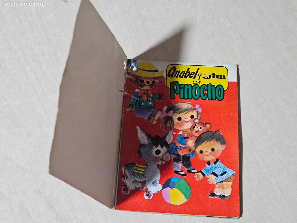 Libros de segunda mano: ANABEL Y JIM CON PINOCHO REGALO DE LA ROPA JIM Y MISS. FABRILMALLA, S.A. IGUALADA, 1969.