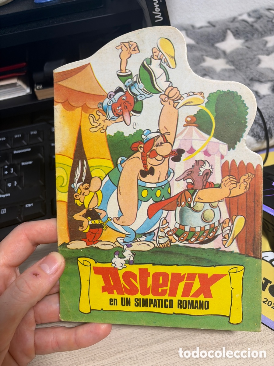 Libros de segunda mano: COMIC2 CUENTO TROQUELADO BRUGUERA ASTERIX 20CM X JAN (SUPERLOPEZ SUPER LOPEZ) EN UN SIMPATICO ROMANO