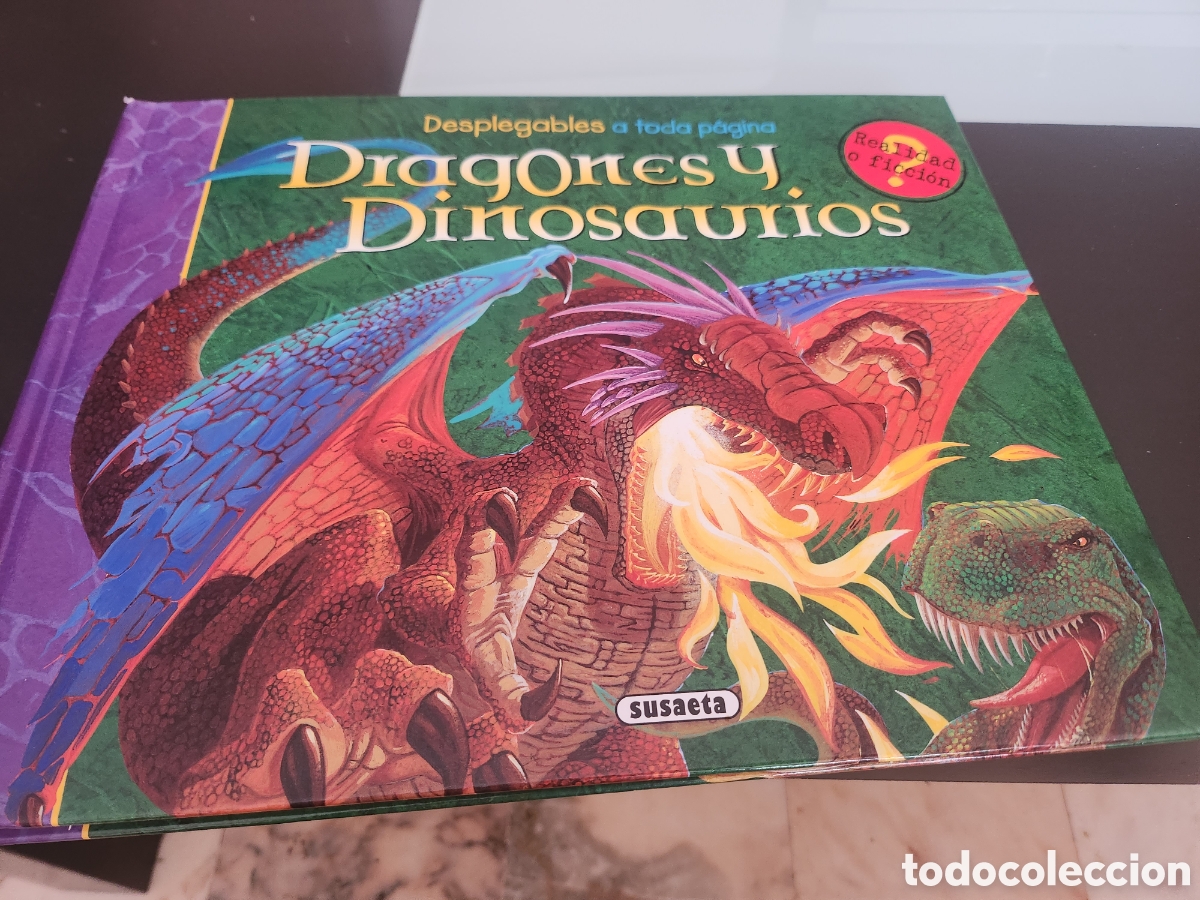 Libros de segunda mano: DRAGONES Y DINOSAURIOS. DESPLEGABLES A TODA P&Aacute;GINA. SUSAETA. ILUSTRACIONES STUART MARTIN