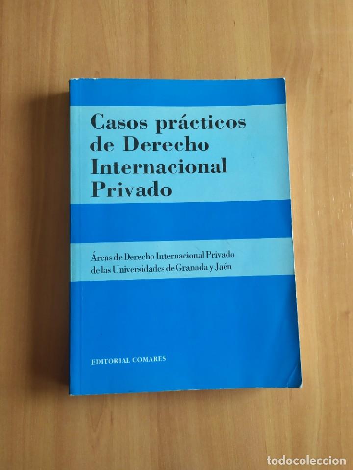 Libros de segunda mano: CASOS PR&Aacute;CTICOS DE DERECHO INTERNACIONAL PRIVADO COMARES - Foto 1