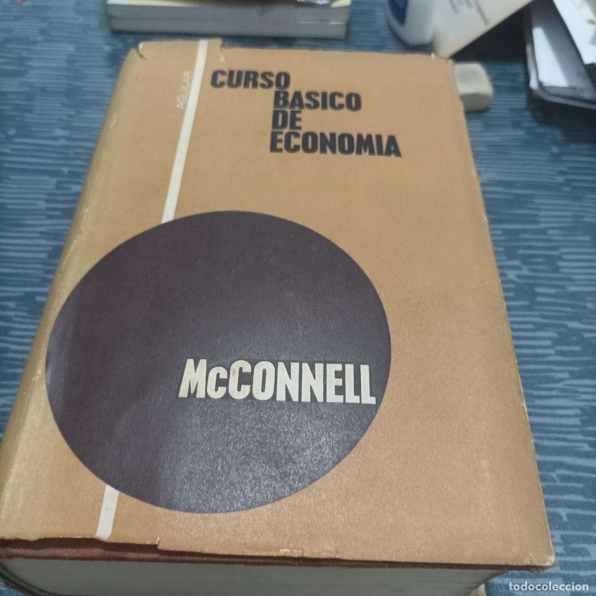 Libros de segunda mano: CURSO BASICO DE ECONOMIA, MCCONNEL,AGUILAR,1968,1117 PAG.