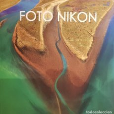 Libros de segunda mano: FOTO NIKON 10 / AÑO 2011 / LAS MEJORES FOTOGRAFÍAS DEL AÑO. ED-DPI / COMO NUEVO. Lote 144218546
