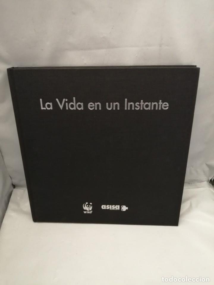 Libri di seconda mano: WWF/ADENA Y ASISA: LA VIDA EN UN INSTANTE