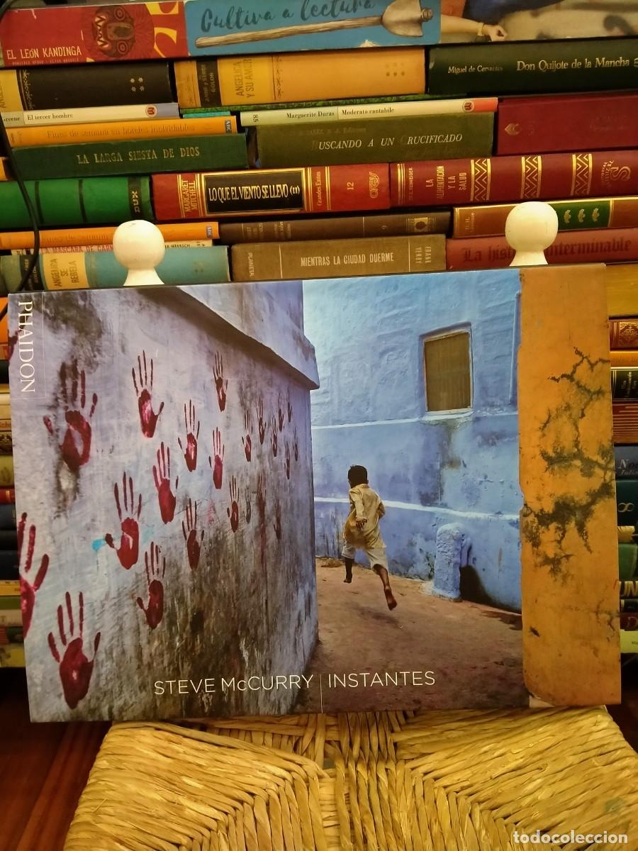 Libros de segunda mano: Instantes - Steve McCurry - Foto 1