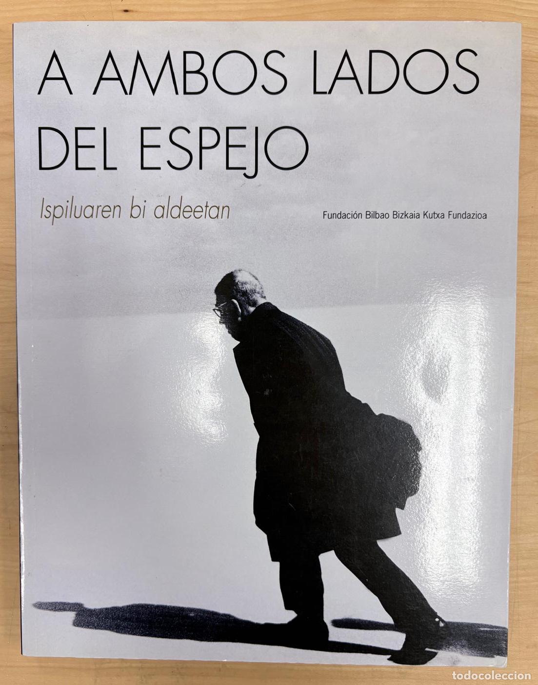 Libros de segunda mano: A AMBOS LADOS DEL ESPEJO / ISPILUAREN BI ALDEETAN. FUNDACI&Oacute;N BILBAO BIZKAIA KUTXA FUNDAZIOA, 2004