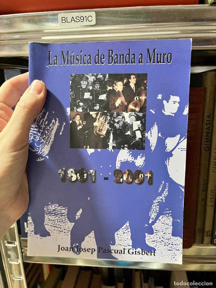 Libros de segunda mano: BLAS91C Joan Josep Pascual Gisbert, La M&uacute;sica de Banda a Muro 1901-2001, Ayuntamiento de Muro.