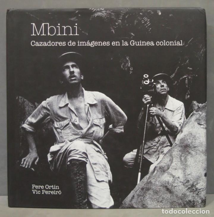 Libros de segunda mano: MBINI. CAZADORES DE IM&Aacute;GENES EN LA GUINEA COLONIAL