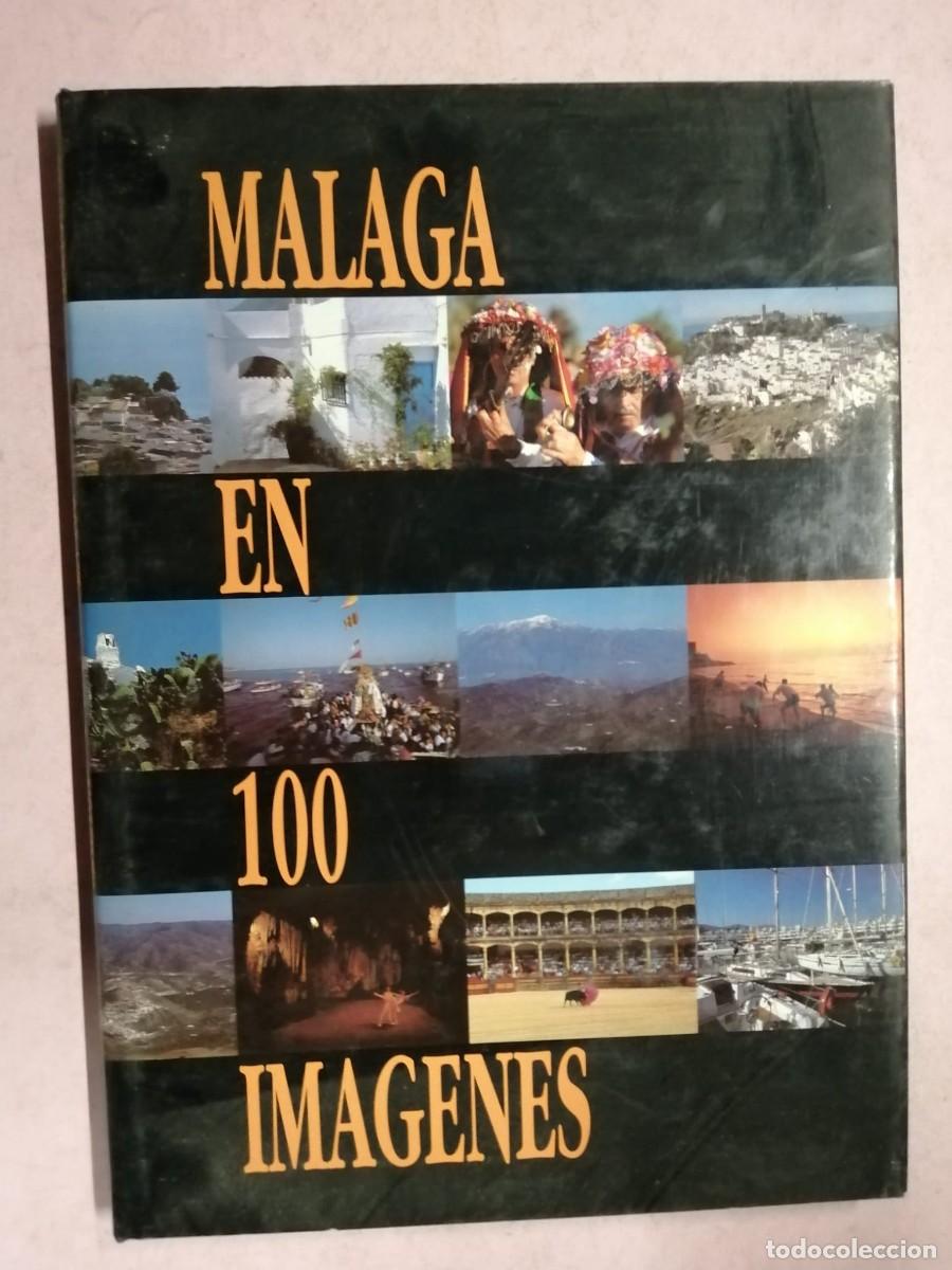 Libros de segunda mano: MALAGA EN 100 IMAGENES