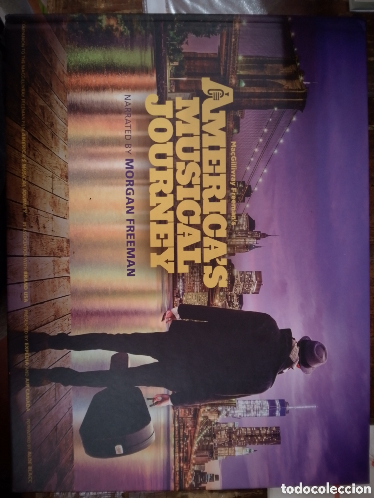Libros de segunda mano: AMERICA'S MUSICAL JOURNEY. MACGILLIVRAY FREEMAN. NARRATED BY MORGAN FREEMAN. FREEMAN FILMS. 2017