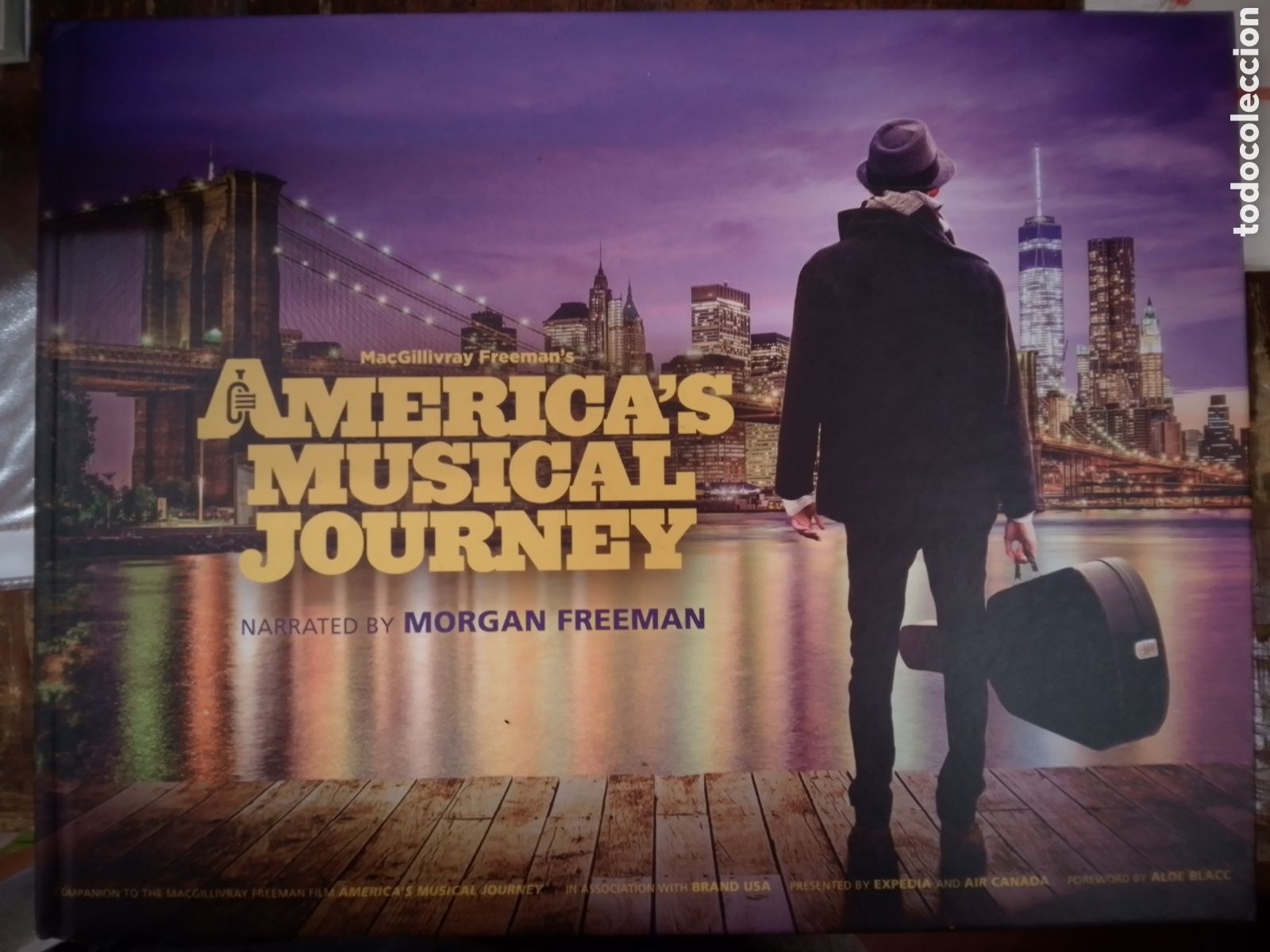 Libros de segunda mano: AMERICA'S MUSICAL JOURNEY. MACGILLIVRAY FREEMAN. NARRATED BY MORGAN FREEMAN. FREEMAN FILMS. 2017