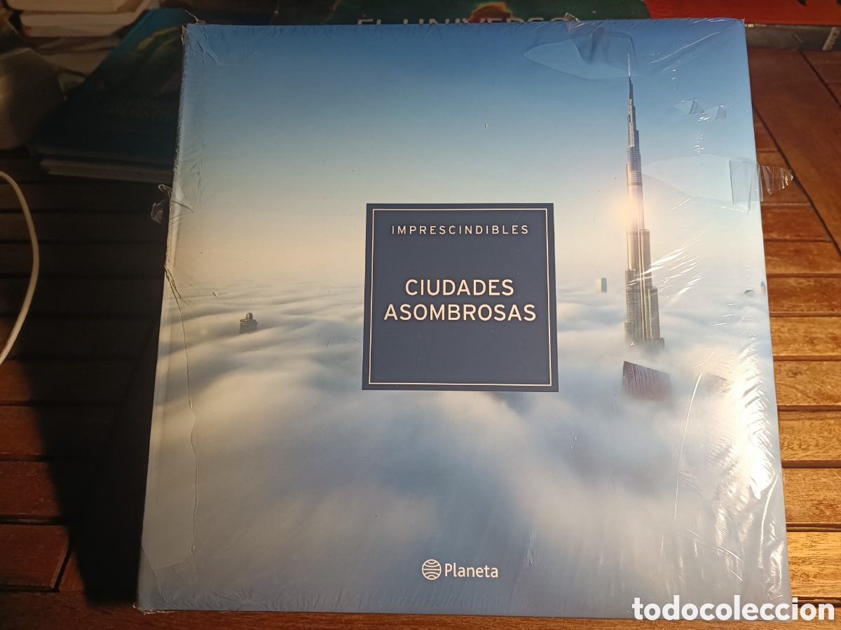 Libros de segunda mano: Imprescindibles ciudades asombrosas planeta precintado