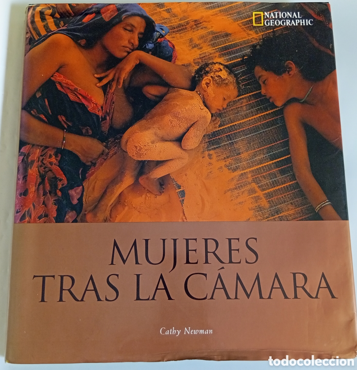 Second hand books: MUJERES TRAS LA C&Aacute;MARA, CATHY NEWMAN( Nacional Geographic).