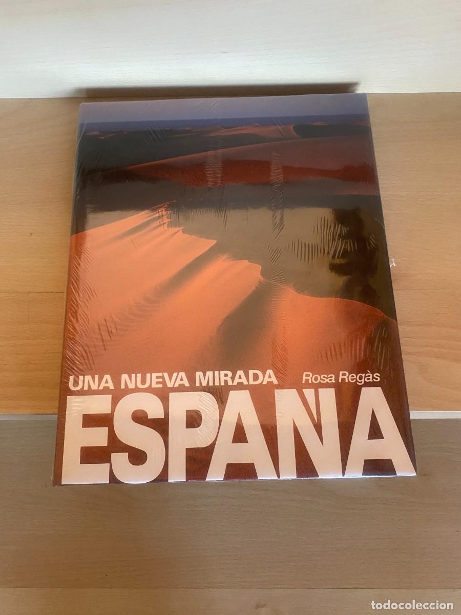 Libros de segunda mano: Espa&ntilde;a, una nueva mirada, Rosa Reg&aacute;s, Lunwerg. Nuevo, con retr&aacute;ctil original