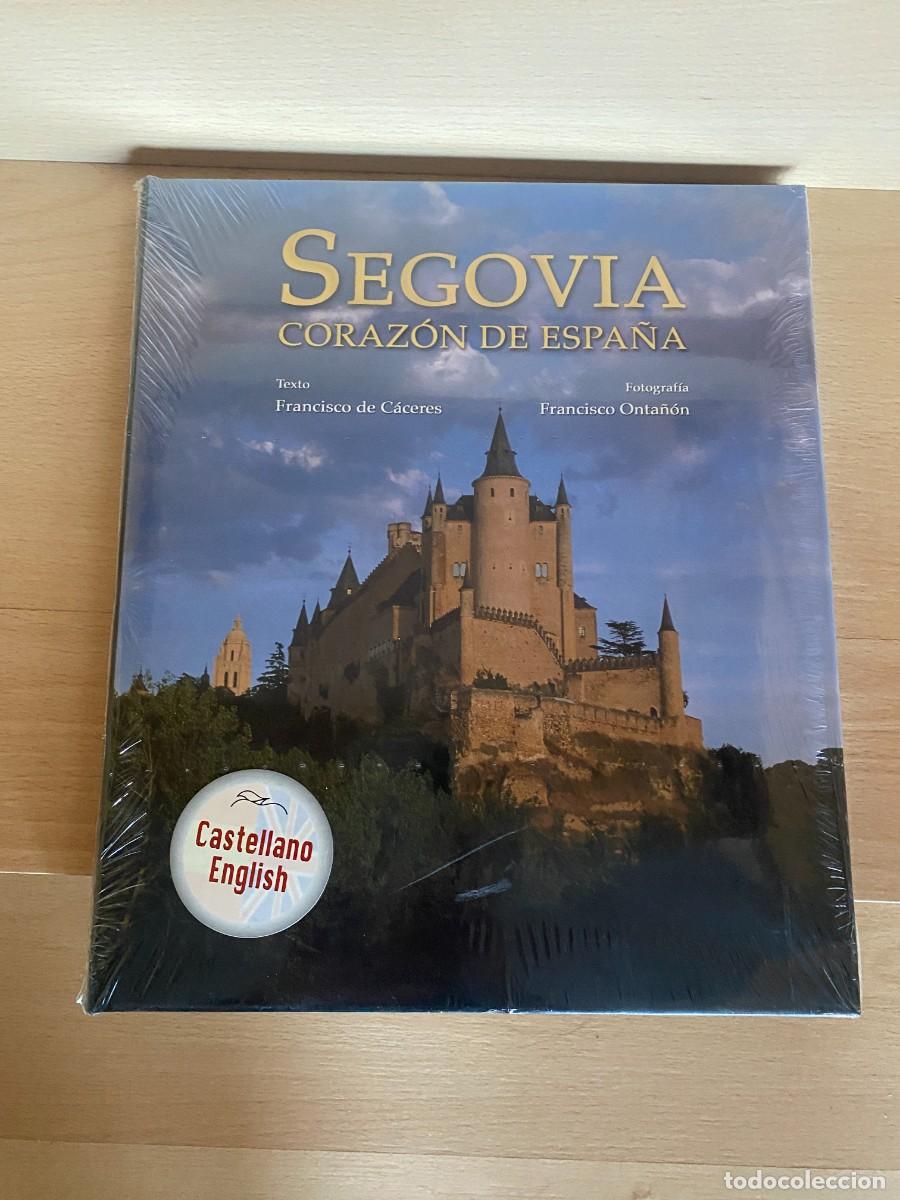 Libros de segunda mano: Segovia, coraz&oacute;n de Espa&ntilde;a, Lunwerg, biling&uuml;e castellano-ingl&eacute;s, nuevo retr&aacute;ctil original
