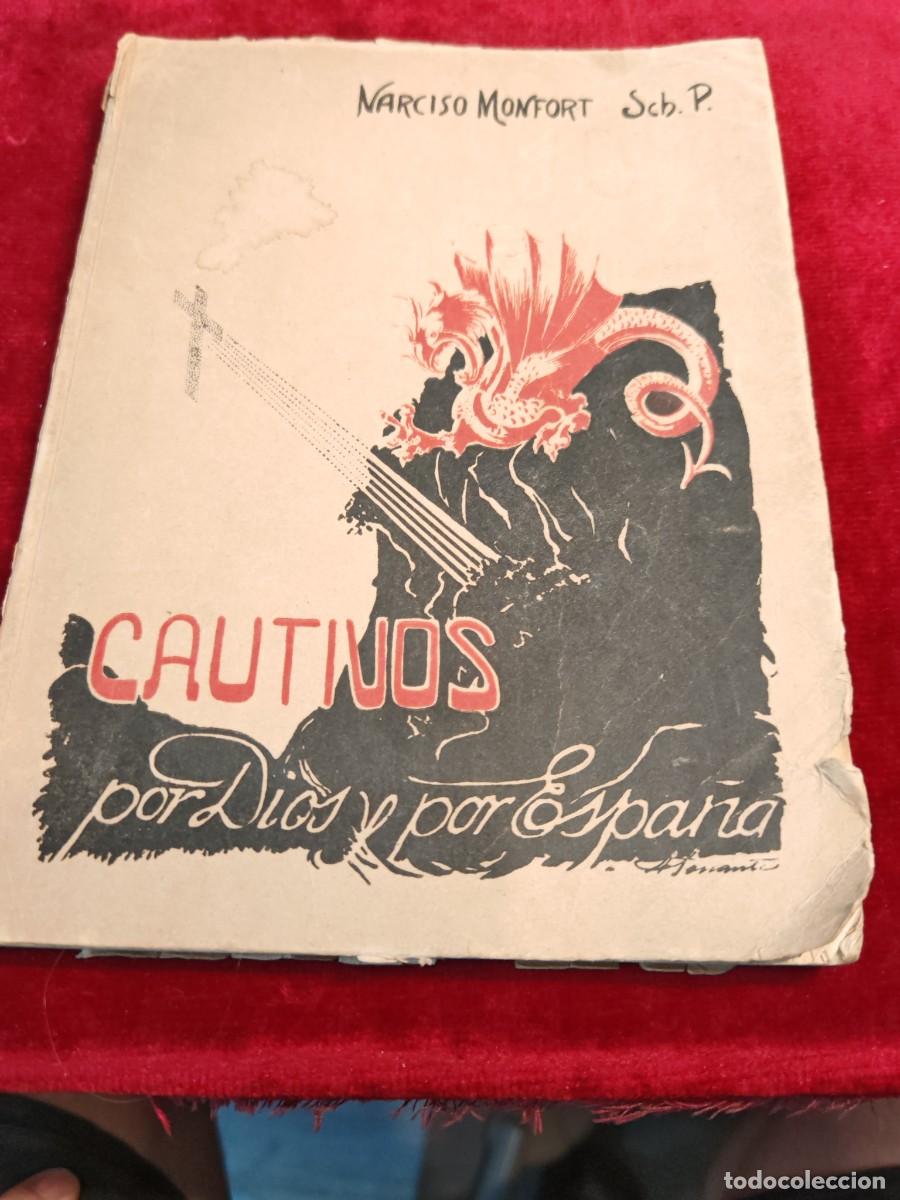 Libros de segunda mano: libro tema guerra civil cautivos por dios y por Espa&ntilde;a .Zaragoza 1942.narciso monfort.