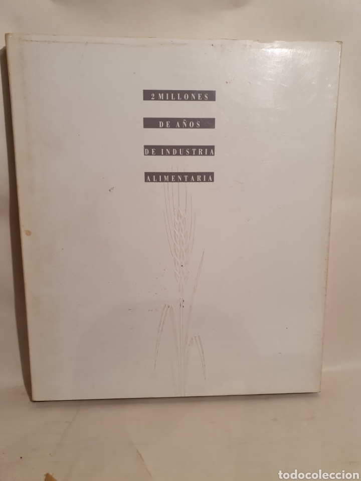 Second hand books: 2 MILLONES DE A&Ntilde;OS DE INDISTRIA ALIMENTARIA. NESTLE 1991.