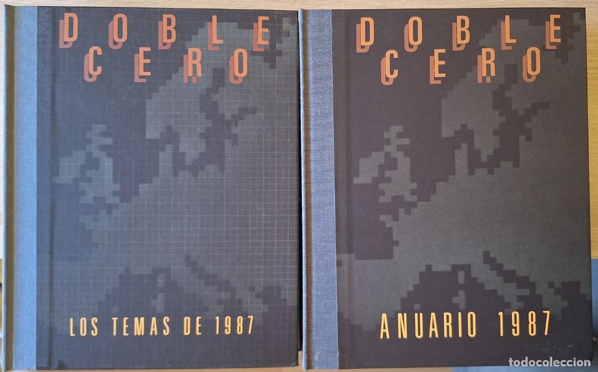 Libros de segunda mano: DOBLE CERO ANUARIO 1987. LOS TEMAS DE 1987. INCLUYE VINILO Y DESPLEGABLE. 2 TOMOS EN UN ESTUCHE. -
