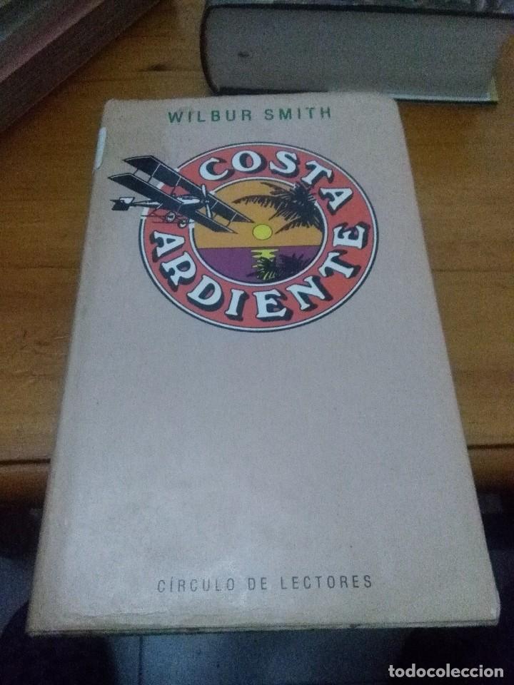 Libros de segunda mano: COSTA ARDIENTE. WILBUR SMITH. EST4B3 - Foto 1