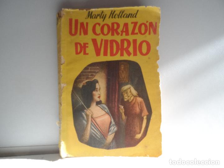 Second hand books: UN CORAZON DE VIDRIO MARTY HOLLAND - PRIMERA EDICION MARZO 1951