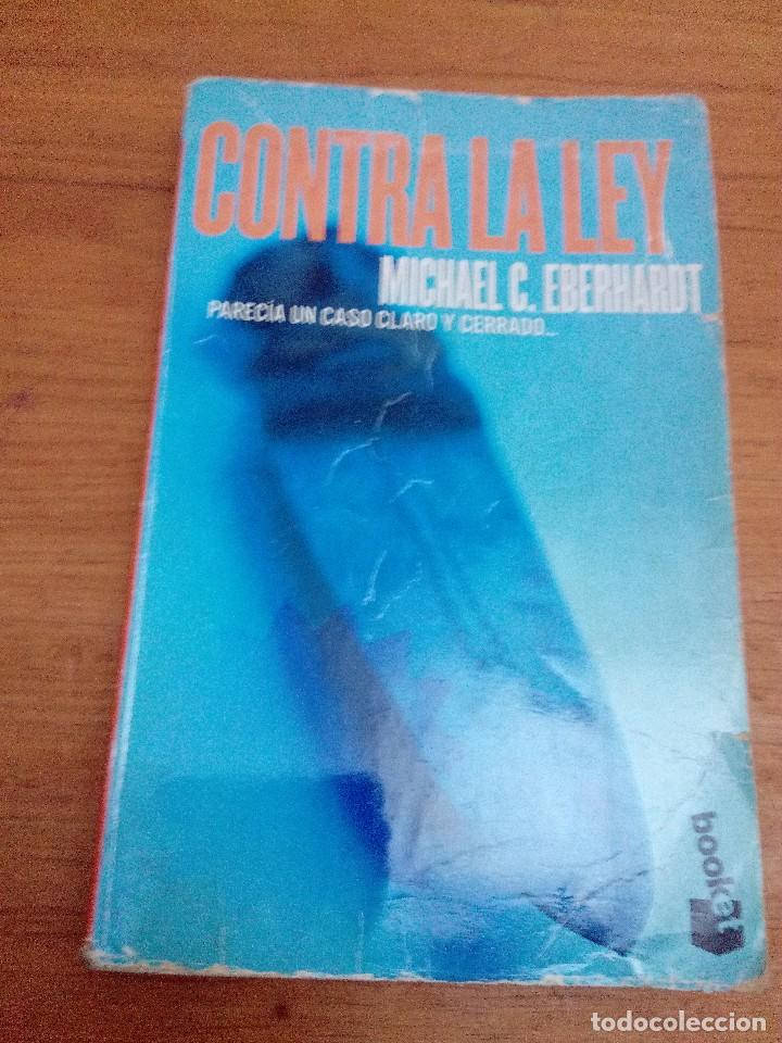 Libros de segunda mano: CONTRA LA LEY. MICHAEL C. EBERHARDT. EST9B4 - Foto 1