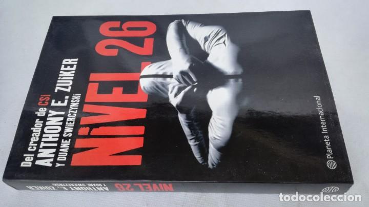 Second hand books: NIVEL 26	 / 	ANTHONY E ZUIKER - DUANE SWIERCZYNSKY	 / 	DEL CREADOR DE SERIE  CSI EN TV	 / 	PLANETA